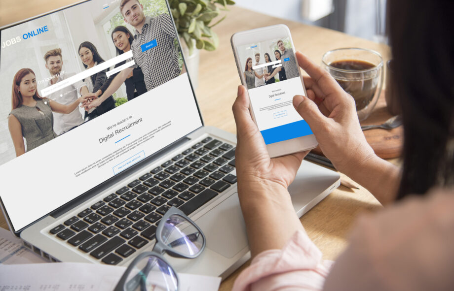 Happiness Asian Woman working from home using laptop online meeting in home office